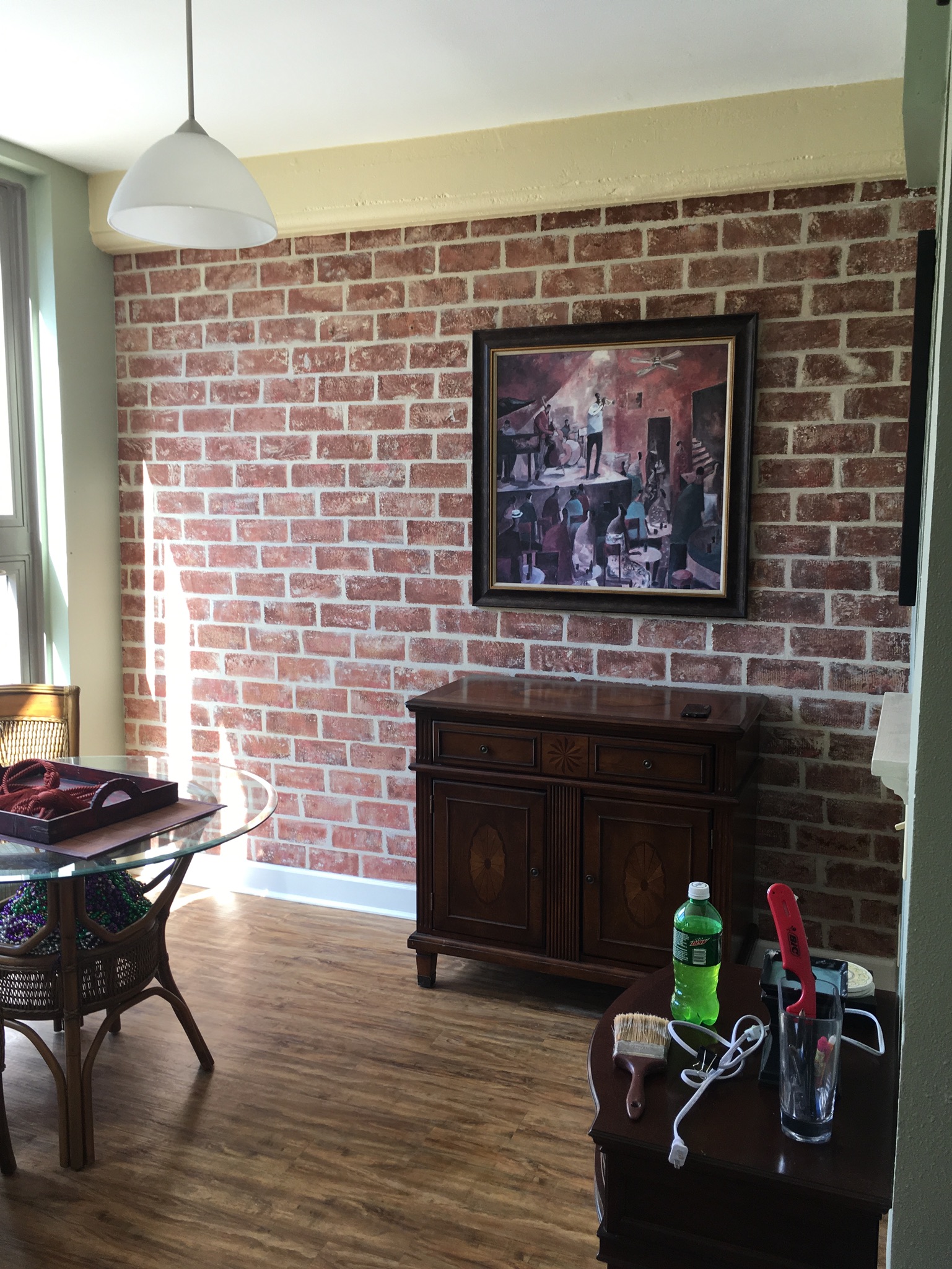 Faux Brick Wall… Staging a Warehouse District Condo with Art!